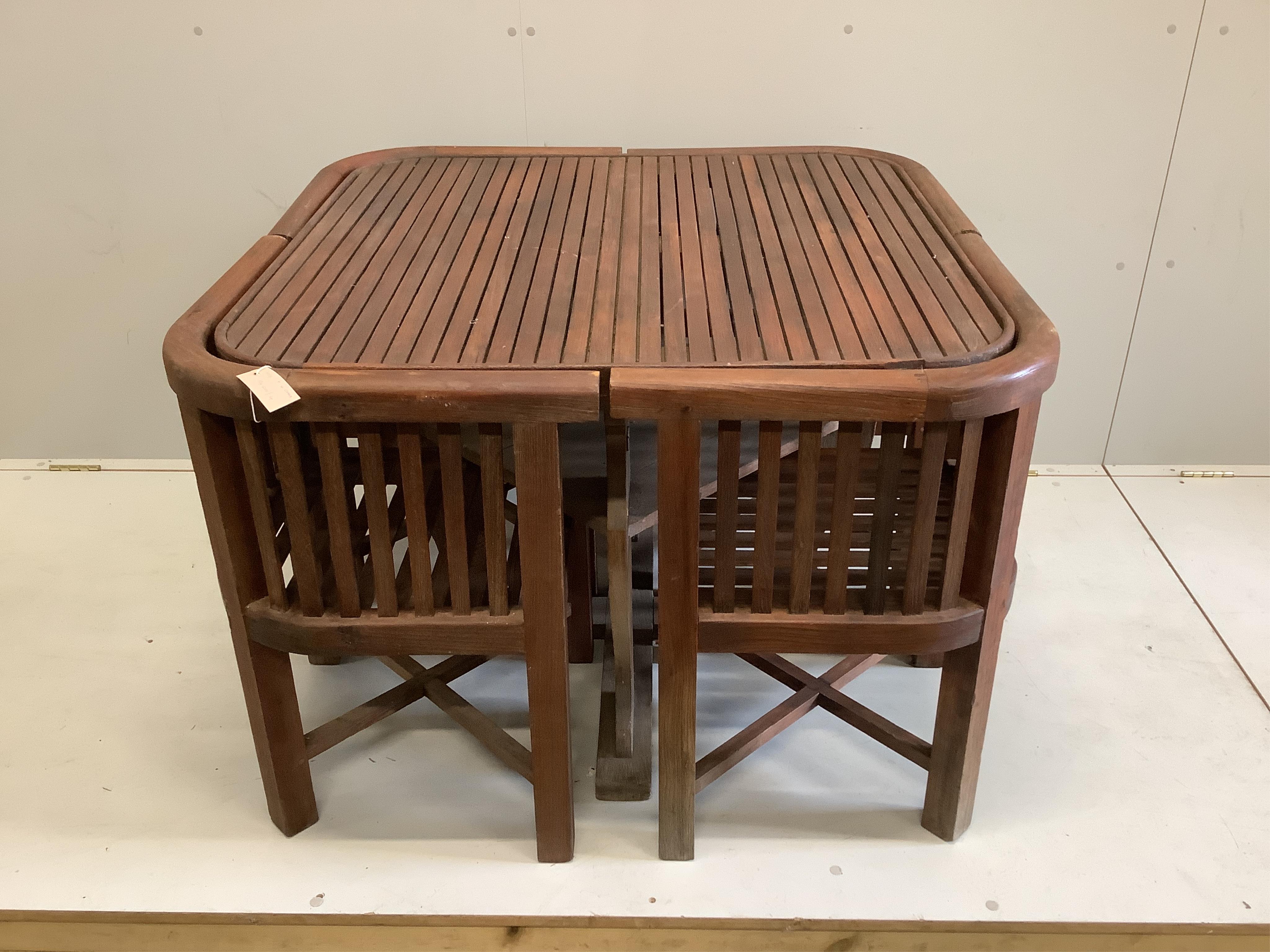 Hughes Bolckow for Heals, a square teak garden table, width 102cm, height 70cm and four chairs